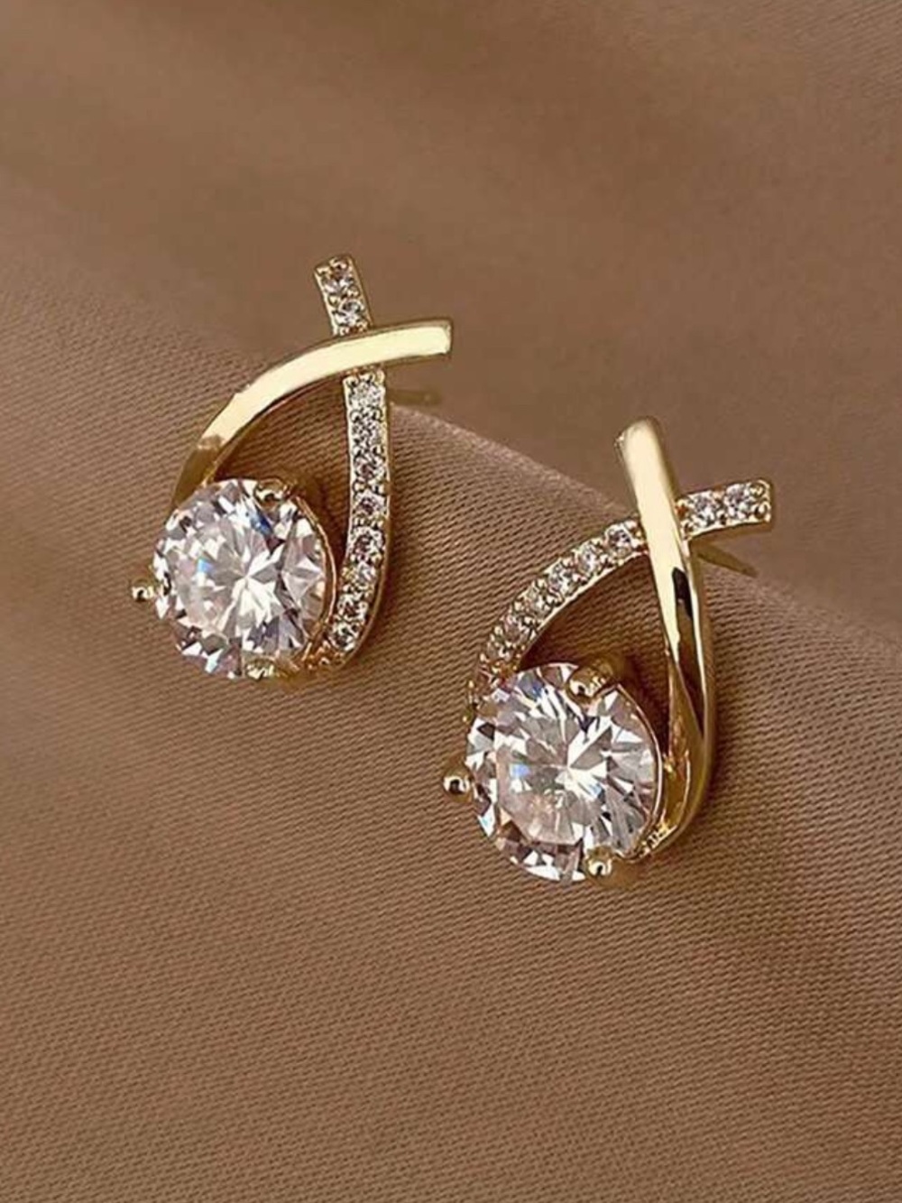 Gold Crystal Stud Earrings - Elegant Swirl Design